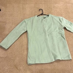 Mint pea coat with white buttons. Never been worn!